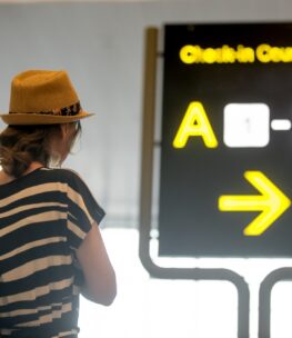 girl-looking-airport-information-board_1163-3476 girl-looking-airport-information-board_1163-3476